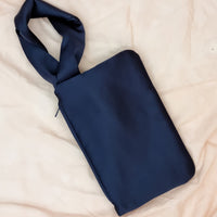 AUGUST NIGHT KNOT CLUTCH IN NAVY SATIN