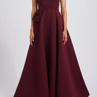 AMSALE FAILLE GOWN WITH ASYMMETRIC BODICE IN RUBY