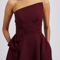 AMSALE FAILLE GOWN WITH ASYMMETRIC BODICE IN RUBY