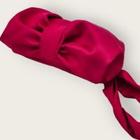 AUGUST NIGHT BOW CLUTCH IN FUSCHIA SATIN