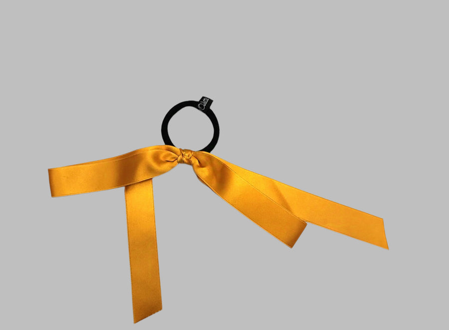 JENNIFER OUELLETTE LARGE SATIN BOW HAIR TIE IN YELLOW