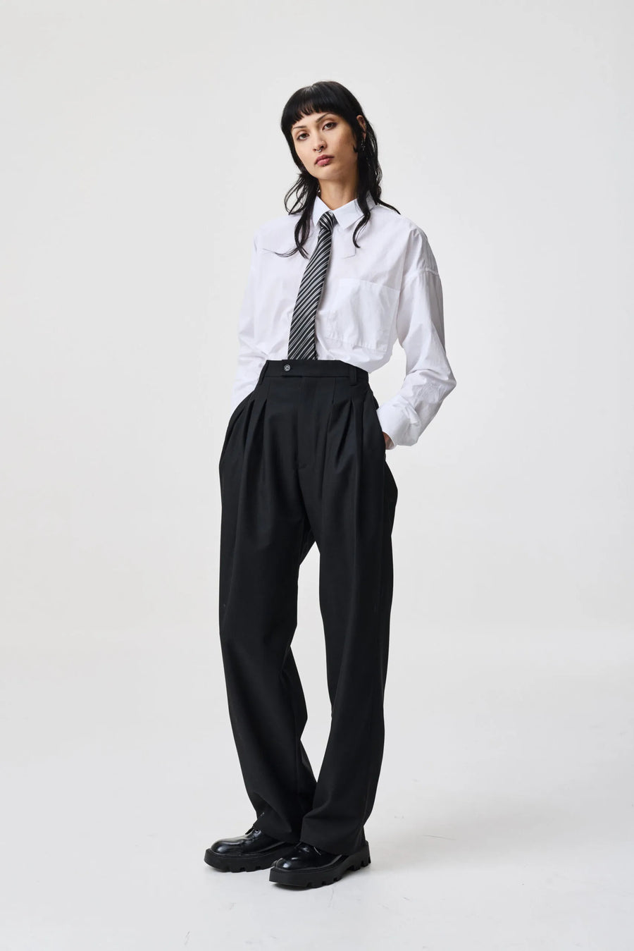 ADNYM TUCK TROUSERS IN BLACK