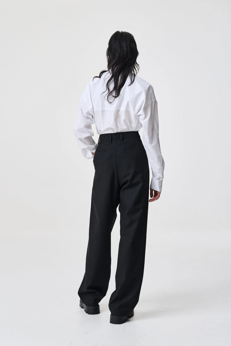 ADNYM TUCK TROUSERS IN BLACK
