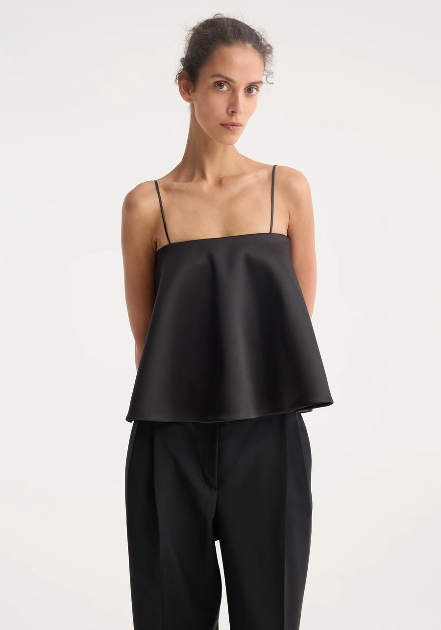 ROHE PEPLUM SATIN TOP IN BLACK