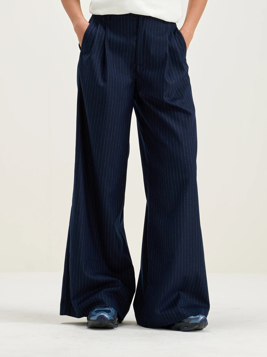 BELLEROSE VOLKERT TROUSERS IN NAVY/WHITE PIN STRIPE