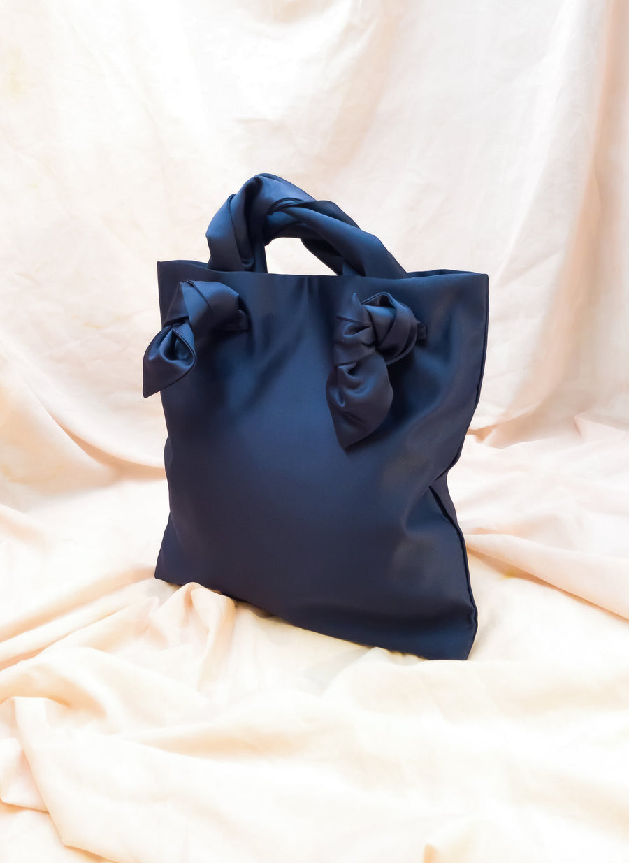 AUGUST NIGHT KNOT CROSSBODY TOTE IN NAVY