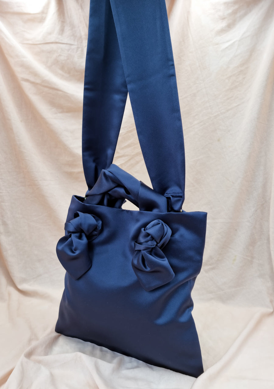 AUGUST NIGHT KNOT CROSSBODY TOTE IN NAVY